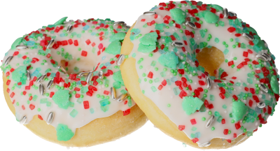 Leckerer Donut mit schöner grüner und roter Streudekoration mit Tannenmotiv.