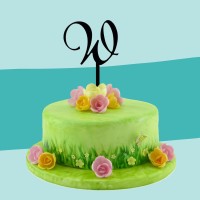 Cake-Topper schwarz W auf Torte
